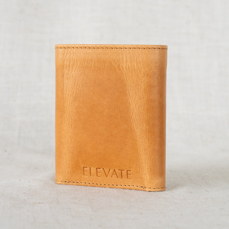 Titus Trifold Wallet by Elevate on linen